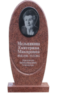 Овальный памятник из красного гранита